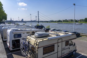 Motorhome parking space on the banks of the Rhine, Düsseldorf skyline on the Rhine, Rhine Tower,