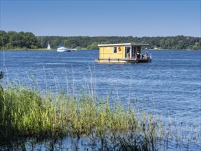 House boat anchors, lake Plauer See, Brandenburg, Germany, Europe