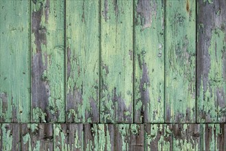 Old wooden door with peeling paint, texture, background, Germany, Europe