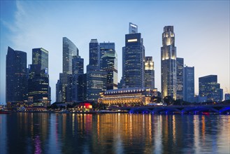 Singapore skyline and Marina Bay in evening