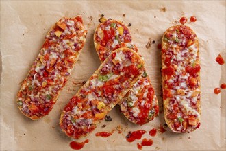 Pizza on a baguette, top view, close-up, no people, fast food, street food