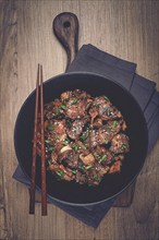 Bulgogi, with mushrooms, with sesame seeds and green onions, Korean cuisine, homemade, no people