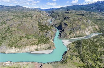 Confluence of river Rio Baker and Rio Chacabuco, aerial view, muddy water of Rio Chacabuco merges