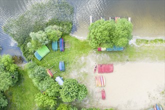 Canoes at a rental station, drone shot, village Granzow near Mirow, Mecklenburg lake district,