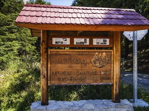 Signpost to campsite and refugio at the river 'Rio de los Nadis', Carretera Austral south of