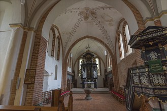 Interior of St Mary's Church, Brick Gothic, at the back the 18th century Baroque altar, on the