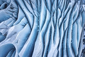 Aerial view of abstract geometric patterns of an glacier landscape, AI generated