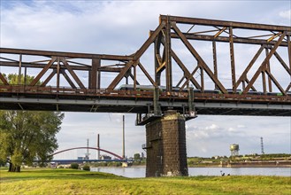 The railway bridge Duisburg-Hochfeld-Rheinhausen, over the Rhine, regional trains and many goods