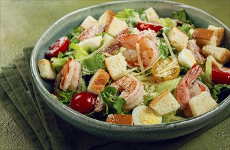 Caesar salad, with tiger prawns, shrimp salad, lettuce, quail eggs, cherry tomatoes, parmesan