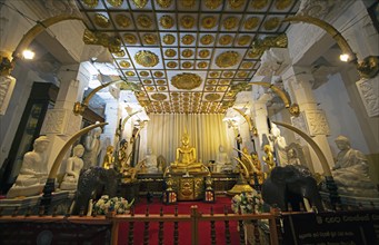 Golden Buddha figure in the Buddhist Temple of the Tooth or Sri Dalada Maligawa, Kandy, Central