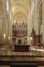 Organ and pulpit of the Gothic church, Ste-Marie-Madelein, interior view, wood carving, arts and