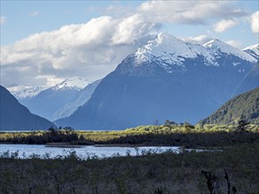 Mountain range at southern shore of Lake Lago Yelcho, along road 235 connecting Futaleufu with the