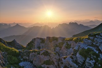 Fribourg Prealps with Gastlosen mountain range at sunrise, Bernese Alps behind, cantons of Fribourg