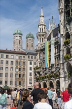 New town hall in neo-Gothic style, behind it the towers of the Church of Our Lady, Munich, Bavaria,