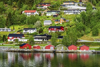 Mountains and Fjord over Norwegian Village, Olden, Innvikfjorden, Norway, Europe