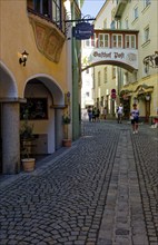 Alley in the old town centre of Kufstein with the Gasthof Zur Post, Kufstein, Tyrol, Austria,