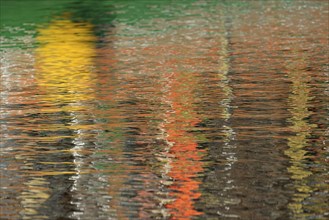 Reflection, colourful reflections on the water surface, maritime impressions, Greetsiel, North Sea,