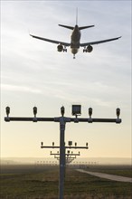 Aircraft on approach, runway lighting, Stuttgart-Echterdingen Airport, Baden-Württemberg, Germany,