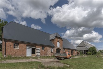 Former horse stable and large barn from 1920 on an old estate, Othenstorf, Mecklenburg-Vorpommern,