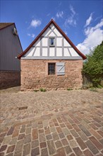 Small half-timbered house on a stone plinth on Hochstraße in Michelstadt, Odenwald, Odenwaldkreis,