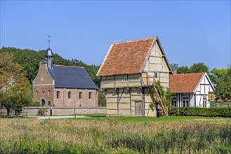 Chapel, school and 17th century spijker, granary in the recreated Hesbaye, Haspengouw village at