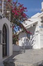 Old town alley in Lindos, way to the Acropolis, Rhodes, Dodecanese archipelago, Greek Islands,