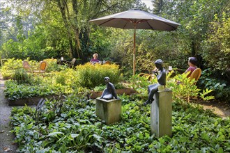 Sculpture group and garden terrace at the teahouse in the historic spa gardens, Bad Pyrmont,