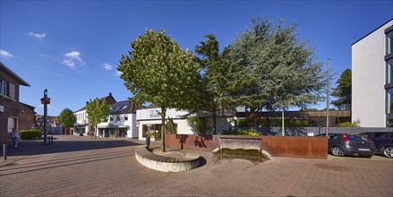 Fountain at the intersection of Bahnhofstraße with Wehrstraße and Deichstraße in Rhede,