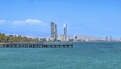 Cyprus, Limassol, Molos seafront promenade and scenic views of Olimpia coast and financial center,