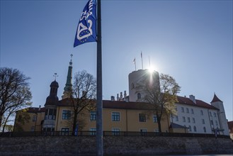 Flag to mark the 20th anniversary of Latvia's accession to the EU, behind it Riga Castle, seat of