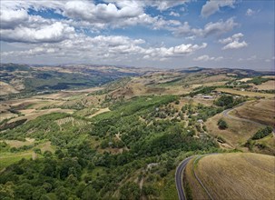 Aerial view of the varied hilly landscape of Basilicata in the north of the Italian province of