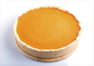 Traditional american sweet pumpkin pie isolated on white background. close up