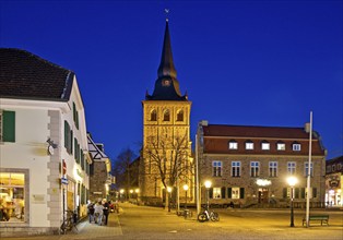 Market square with St Peter and Paul Church and community centre in the evening, Old Town,