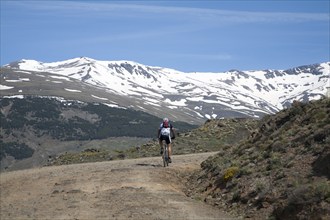 Cycling in the Sierra Nevada Mountains in the High Alpujarras, near Capileira, Granada Province,