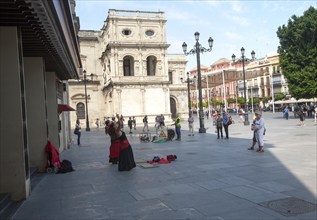 Women flamenco dancers street busking in central Seville, Spain, Europe