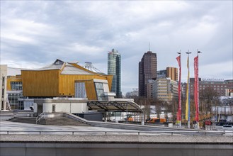 View of Potsdamer Platz with Deutsche Bank headquarters, futuristic Berlin Philharmonic building in