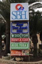 Tourism services signs at Costa Calma resort, Fuerteventura, Canary Islands, Spain, Europe