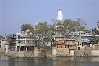 People washing on the shore of lake Manasi-Ganga at the village of Govardhan, Uttar Pradesh, India,