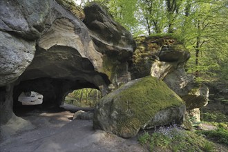 The Hohllay cave showing grooves and circles in the sandstone rock from carving millstones,