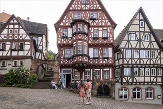 Miltenberg market square with magnificent half-timbered houses, Schnatterloch. The ensemble is one