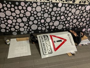 Homeless people sleeping in the underground, symbol of poverty, Buenos Aires, Argentina, South