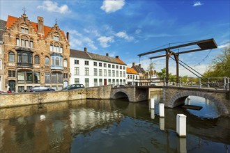 Canal with old bridge and medieval houses. Bruges (Brugge), Belgium, Europe