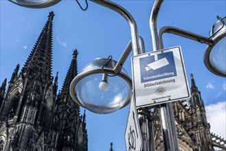 Video surveillance by the police, at Cologne Cathedral, signpost Cologne, Roncalliplatz, Germany,