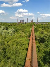 The Duisburg Nord Landscape Park, double blast furnace gas pipeline from the west View across the