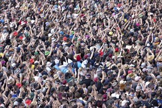 Adenau, Germany, 7 June 2024: Fans listen to bands at Rock am Ring. The festival takes place at the