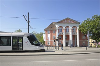 Neoclassicism town hall built in 1910 and tram, tram stop, people, public transport, town hall