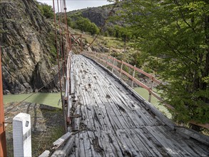 Old-style suspension bridge over Rio Mayer, on road X-905 from Villa o' Higgins to Paso Mayer,