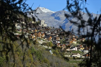 The village of Hérémence with the striking concrete church of St Nicolas, Hérémence, Hérens Valley,