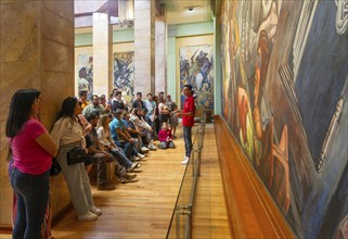 People viewing 'Katharsis' 1934 mural by Jose Clemente Orozco, Palacio de Bellas Artes, Palace of