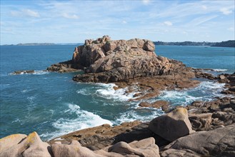 Rock formations on the coast with a view of the vast sea, Ploumanac'h, Ploumanach, Perros-Guirec,